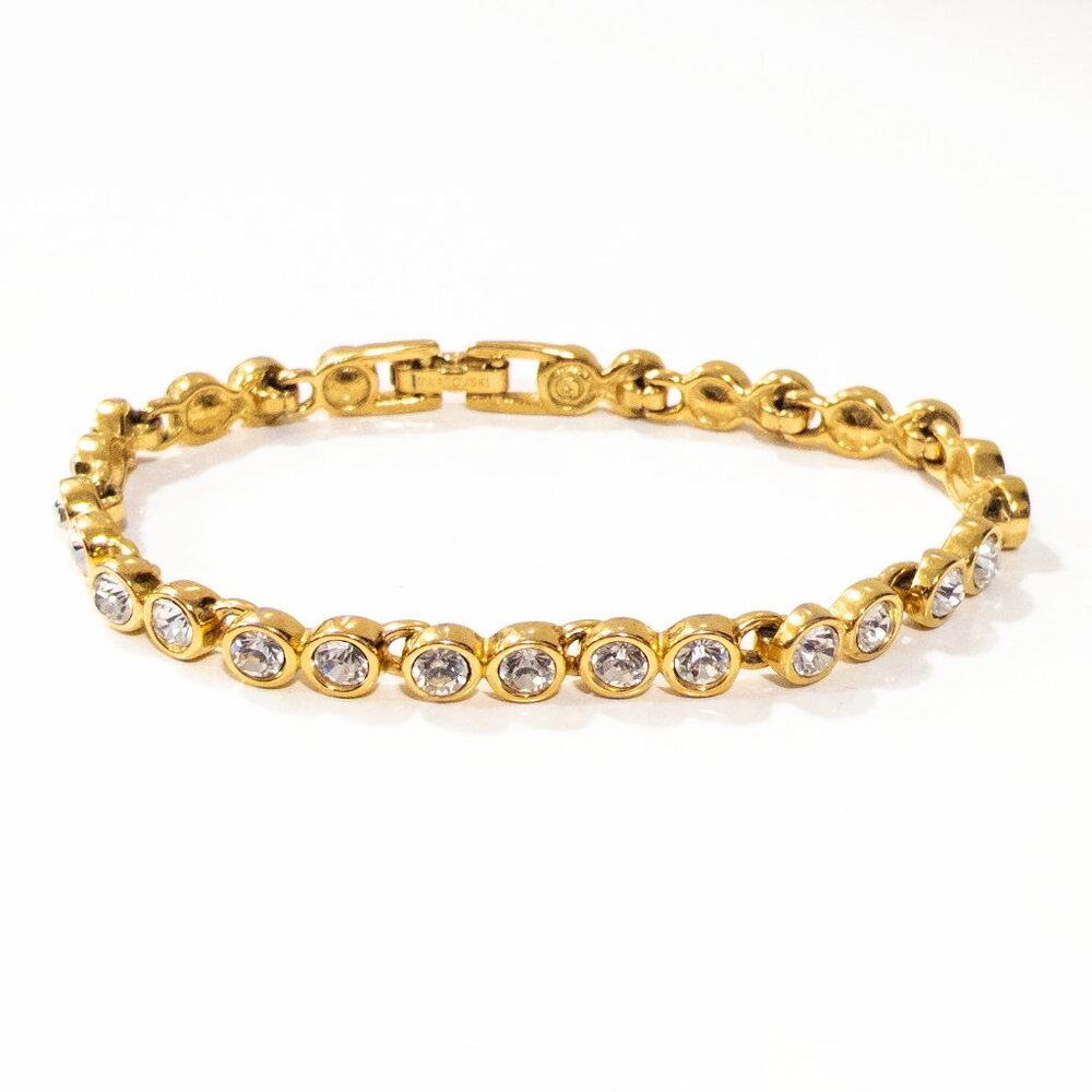 SWAROVSKI Signed Swan Vintage Tennis Bracelet Gold Tone Round Crystal 20cm Long